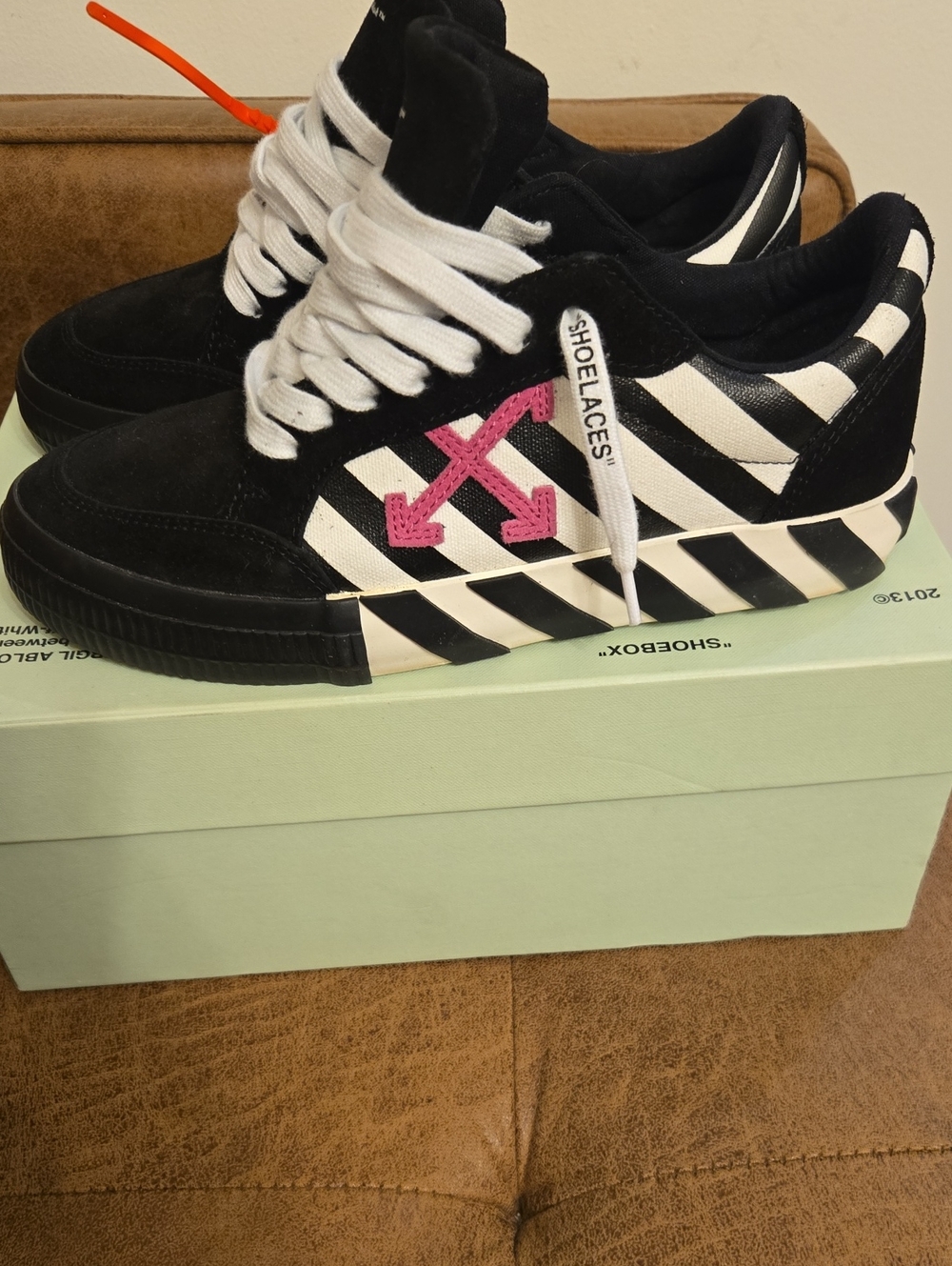 Off-White Black & White Striped Low-Top Sneaker with Pink Arrow Accent
